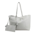 Saint Laurent Paris Shopping Tote 600281 in gray leather featuring dual thin shoulder straps, minimalist design, hanging YSL charm, and detachable zip pouch.