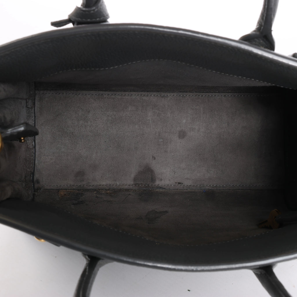 Bolso de mano de piel Sac de Jour de Saint Laurent Paris en color burdeos 347543