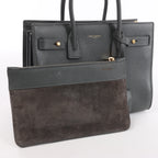 Bolso de mano de piel Sac de Jour de Saint Laurent Paris en color burdeos 347543
