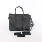 Bolso de mano de piel Sac de Jour de Saint Laurent Paris en color burdeos 347543