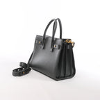 Bolso de mano de piel Sac de Jour de Saint Laurent Paris en color burdeos 347543