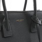 Bolso de mano de piel Sac de Jour de Saint Laurent Paris en color burdeos 347543