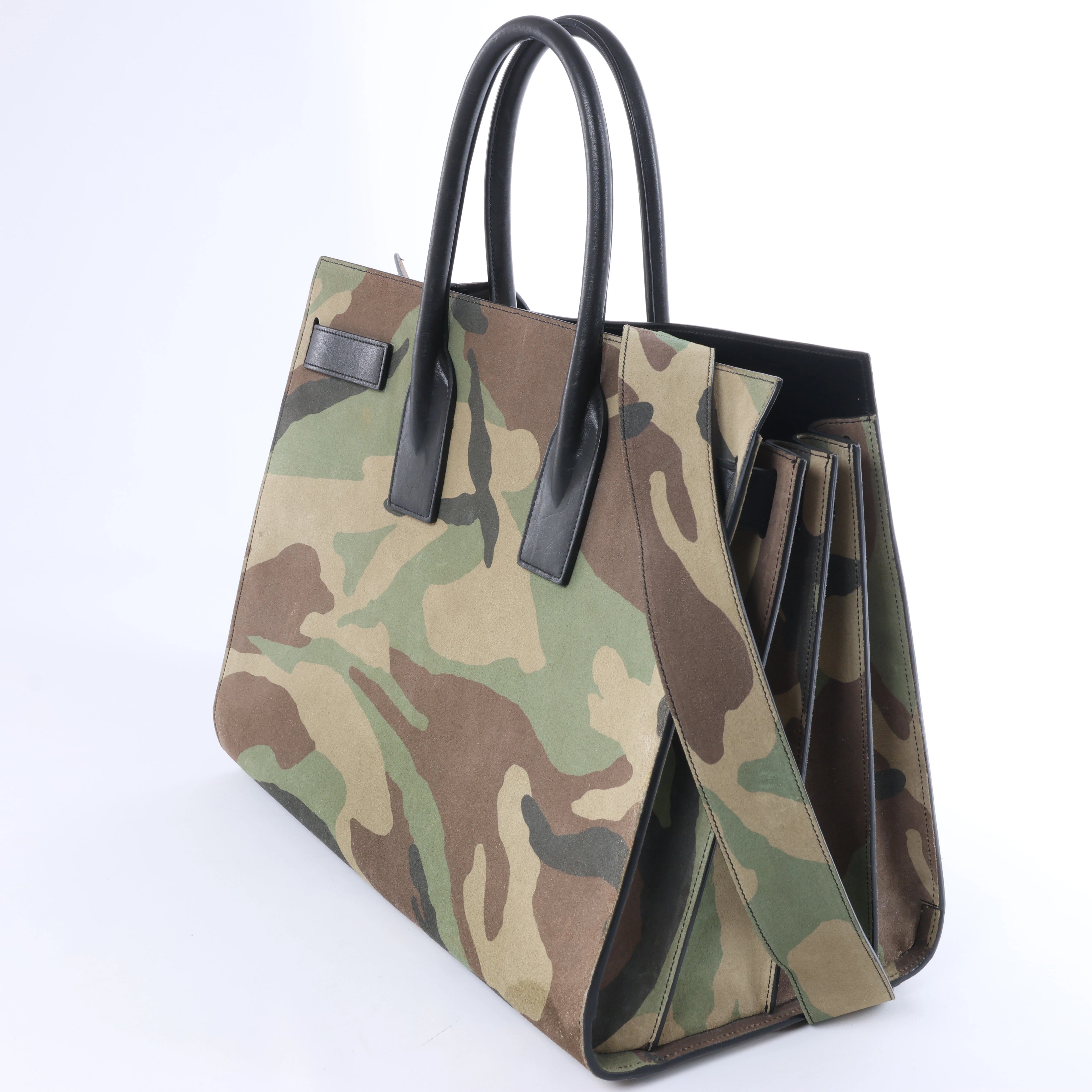Bolso de mano de piel Sac de Jour de Saint Laurent Paris en color burdeos 347543