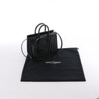 Bolso de mano de piel Sac de Jour de Saint Laurent Paris en color burdeos 347543