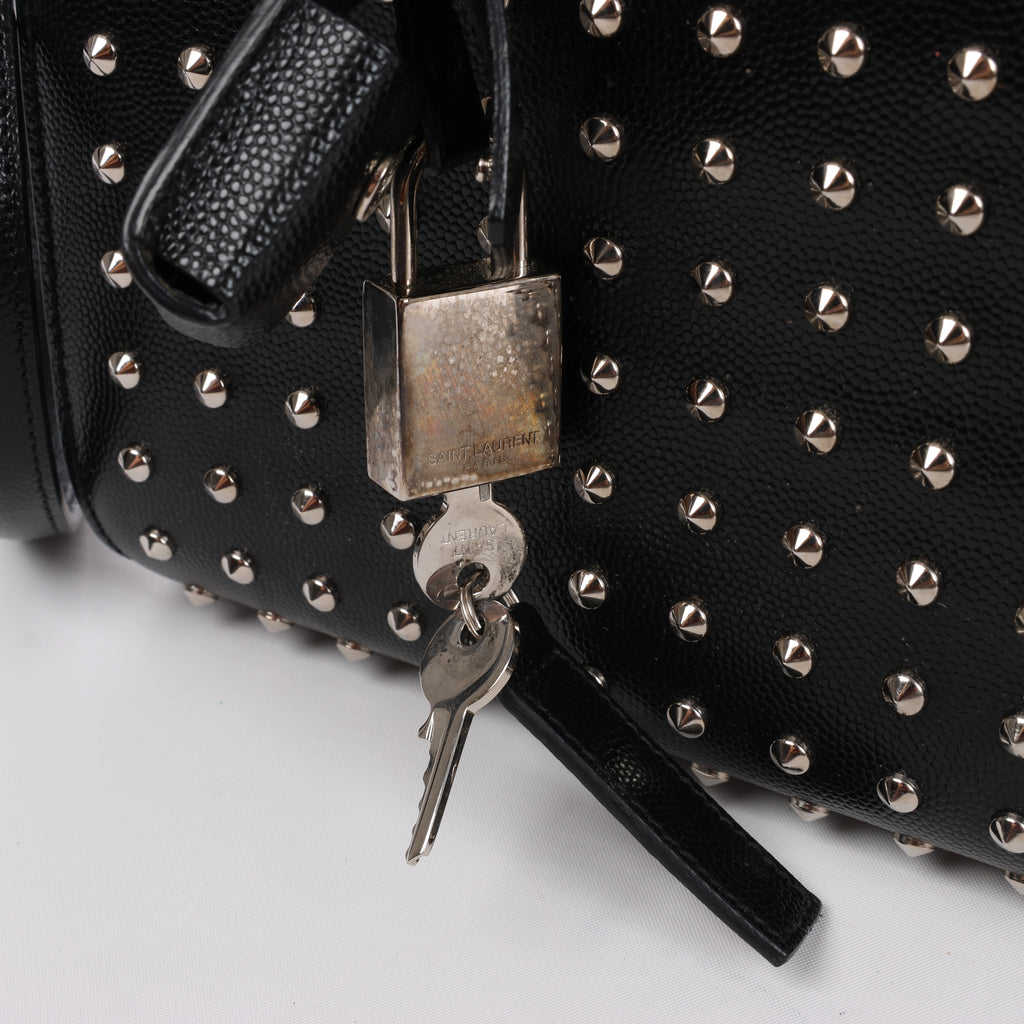 Bolso de mano de piel Sac de Jour de Saint Laurent Paris en color burdeos 347543