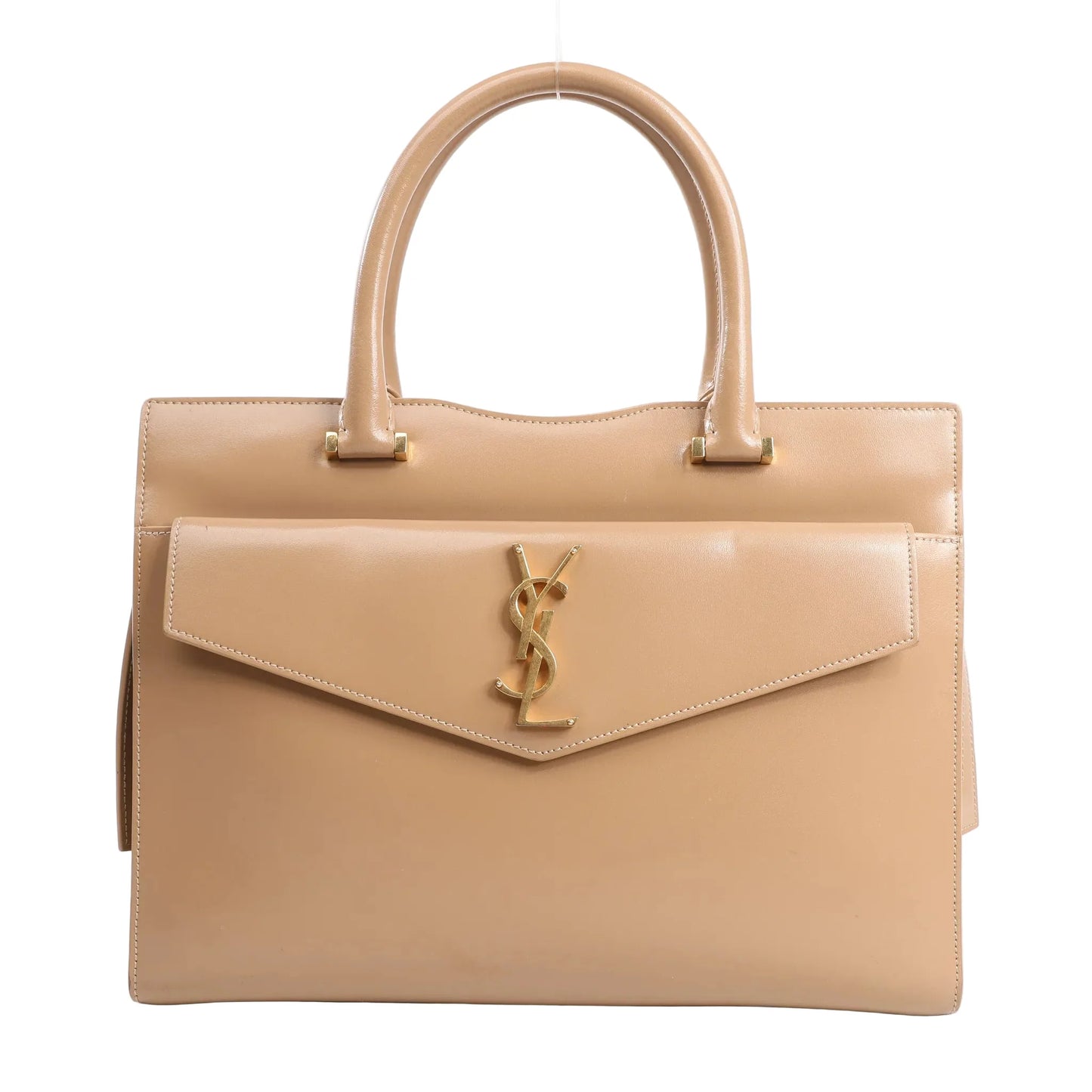 Saint Laurent Paris Uptown leather handbag in beige featuring a structured silhouette, top handles, front flap with gold YSL logo hardware, and smooth leather finish.