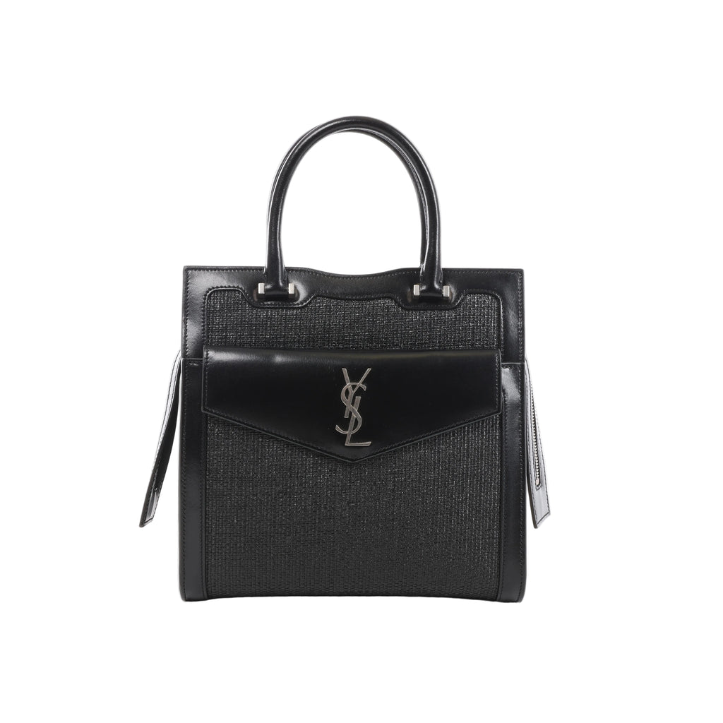 Black Saint Laurent Uptown Small handbag with leather trim, woven raffia panels, double top handles and front envelope pocket with silver-tone YSL logo.