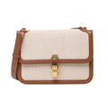 Front view of Saint Laurent Paris Carré Shoulder Bag 647713 in beige canvas with brown leather trim, featuring gold-tone clasp closure, adjustable shoulder strap, and structured rectangular design against a white background.