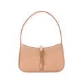 Saint Laurent Le 5 à 7 Mini hobo handbag in smooth beige leather with a single shoulder strap, gold-tone YSL Cassandre hook closure and minimalist design on a white background.
