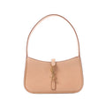 Saint Laurent Le 5 à 7 Mini hobo handbag in smooth beige leather with a single shoulder strap, gold-tone YSL Cassandre hook closure and minimalist design on a white background.