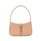 Saint Laurent Le 5 à 7 Mini hobo handbag in smooth beige leather with a single shoulder strap, gold-tone YSL Cassandre hook closure and minimalist design on a white background.