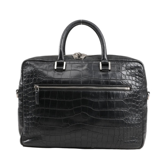 Saint Laurent Sac de Jour handbag in black mock crocodile leather with silver-tone hardware, top handles, and front zipper pocket.