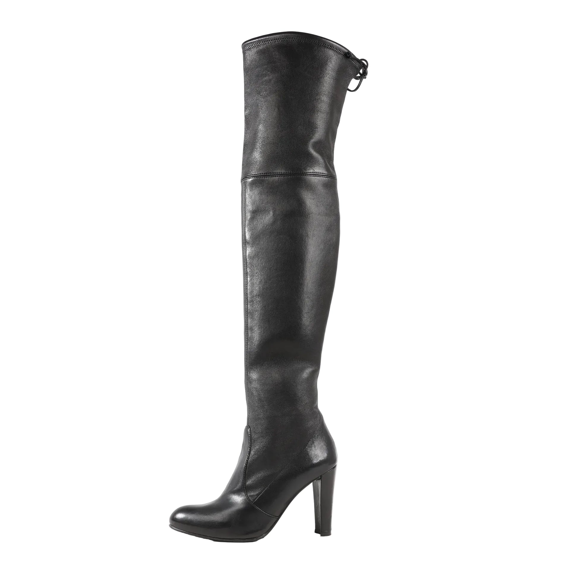 Side view of a single Stuart Weitzman Vidaland over-the-knee boot in black leather, featuring a 100mm high heel, almond toe, and pull-on style with back tie detail.
