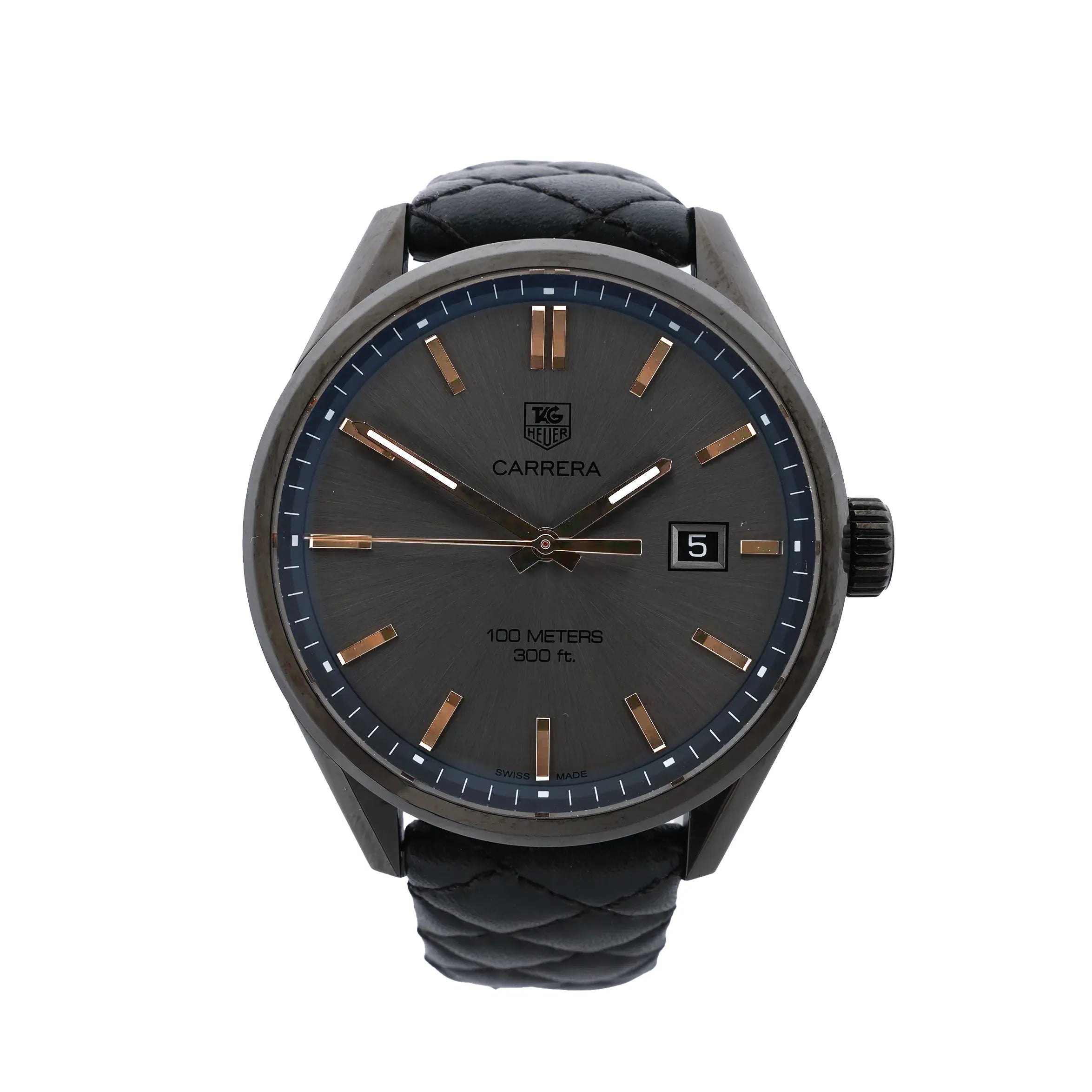 TAG Heuer Carrera watch with gray sunburst dial, gold-tone baton markers, date window and black quilted leather strap.
