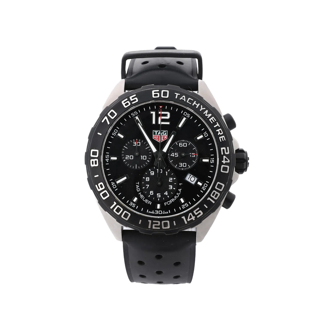 TAG Heuer Formula 1 watch with black chronograph dial, stainless steel case, black rubber strap, date window and tachymeter bezel.