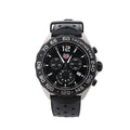 TAG Heuer Formula 1 watch with black chronograph dial, stainless steel case, black rubber strap, date window and tachymeter bezel.