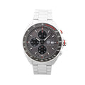 TAG Heuer Formula 1 Calibre 16 stainless steel chronograph watch with gray dial, three subdials, date window, tachymeter bezel, and steel bracelet with red accents.
