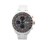 TAG Heuer Formula 1 Calibre 16 stainless steel chronograph watch with gray dial, three subdials, date window, tachymeter bezel, and steel bracelet with red accents.