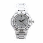 TAG Heuer Kirium stainless steel watch with silver dial, black hands, date window, numbered bezel and integrated steel bracelet.