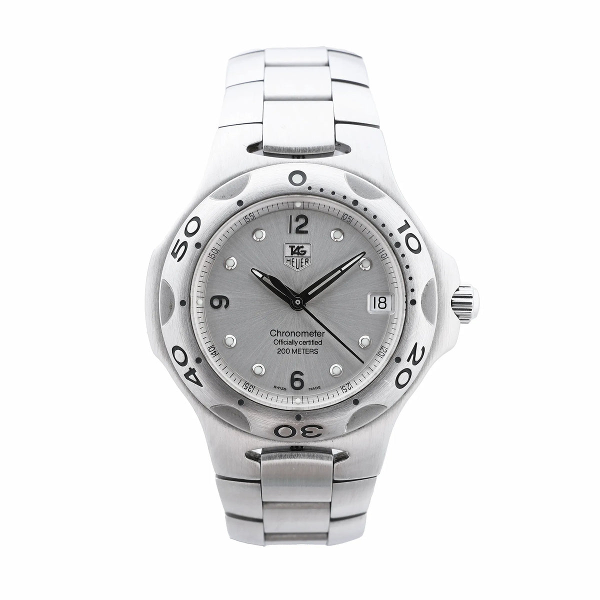 TAG Heuer Kirium stainless steel watch with silver dial, black hands, date window, numbered bezel and integrated steel bracelet.