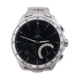 TAG Heuer Link stainless steel watch with black dial, silver tachymeter bezel and integrated metal bracelet.