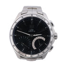 TAG Heuer Link stainless steel watch with black dial, silver tachymeter bezel and integrated metal bracelet.