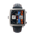 TAG Heuer Monaco Gulf Special Edition watch with square stainless steel case, blue orange black chronograph dial and black perforated leather strap.