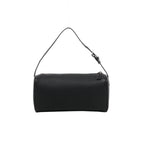 Front view of The Row 90’s black grained leather handbag with an elongated rectangular shape, slim buckled strap and top zip closure.