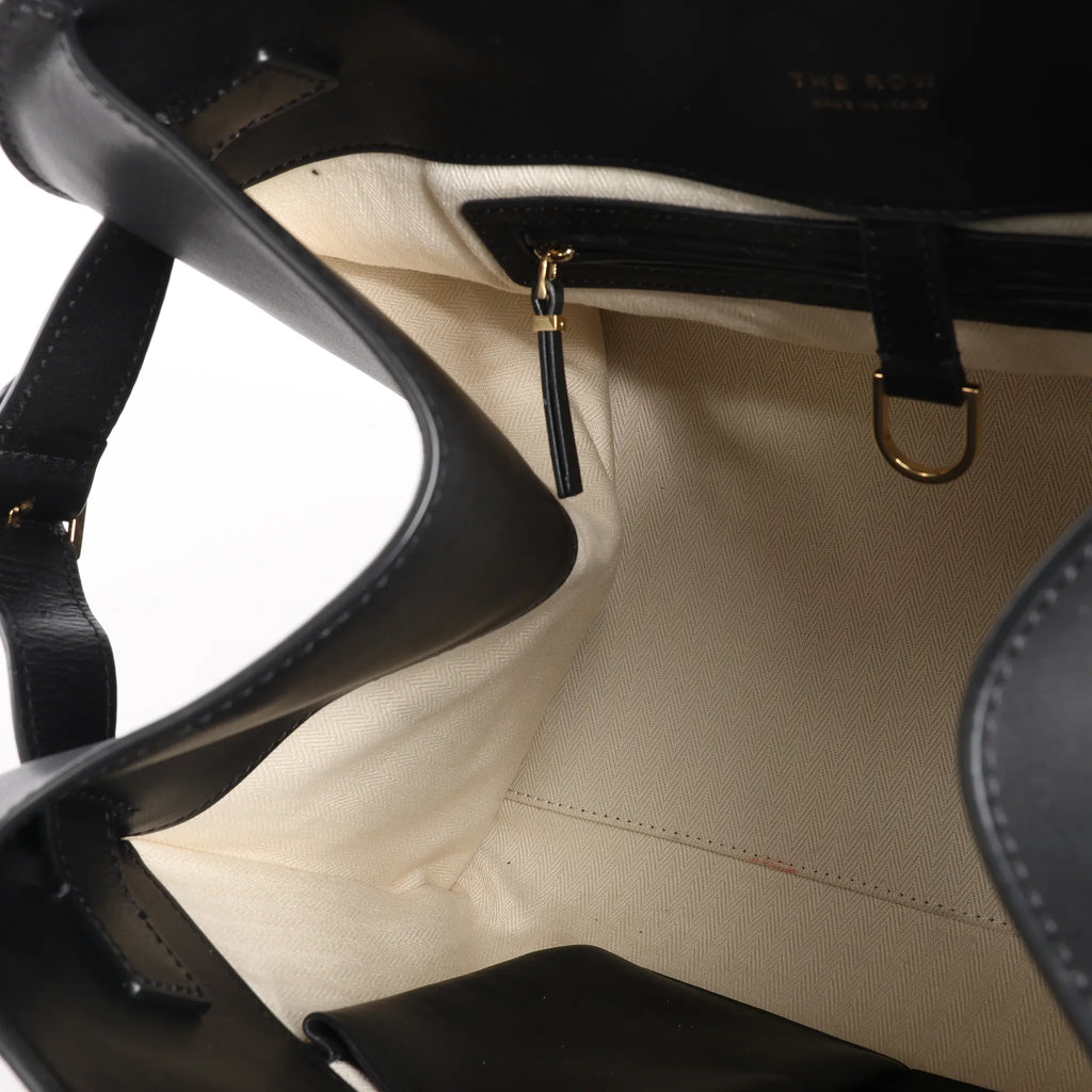 The Row Soft Margaux 15 Leather Handbag in Black