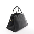 The Row Soft Margaux 15 Leather Handbag in Black