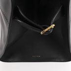 The Row Soft Margaux 15 Leather Handbag in Black