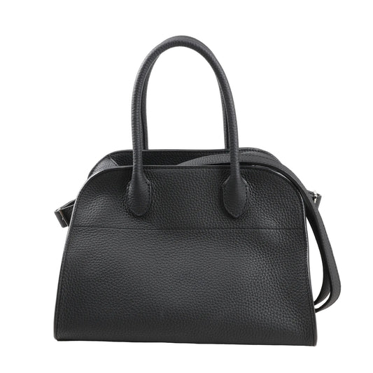 The Row Soft Margaux 10 handbag in black grained leather featuring a softly structured shape, dual top handles, and detachable shoulder strap for versatile carrying.