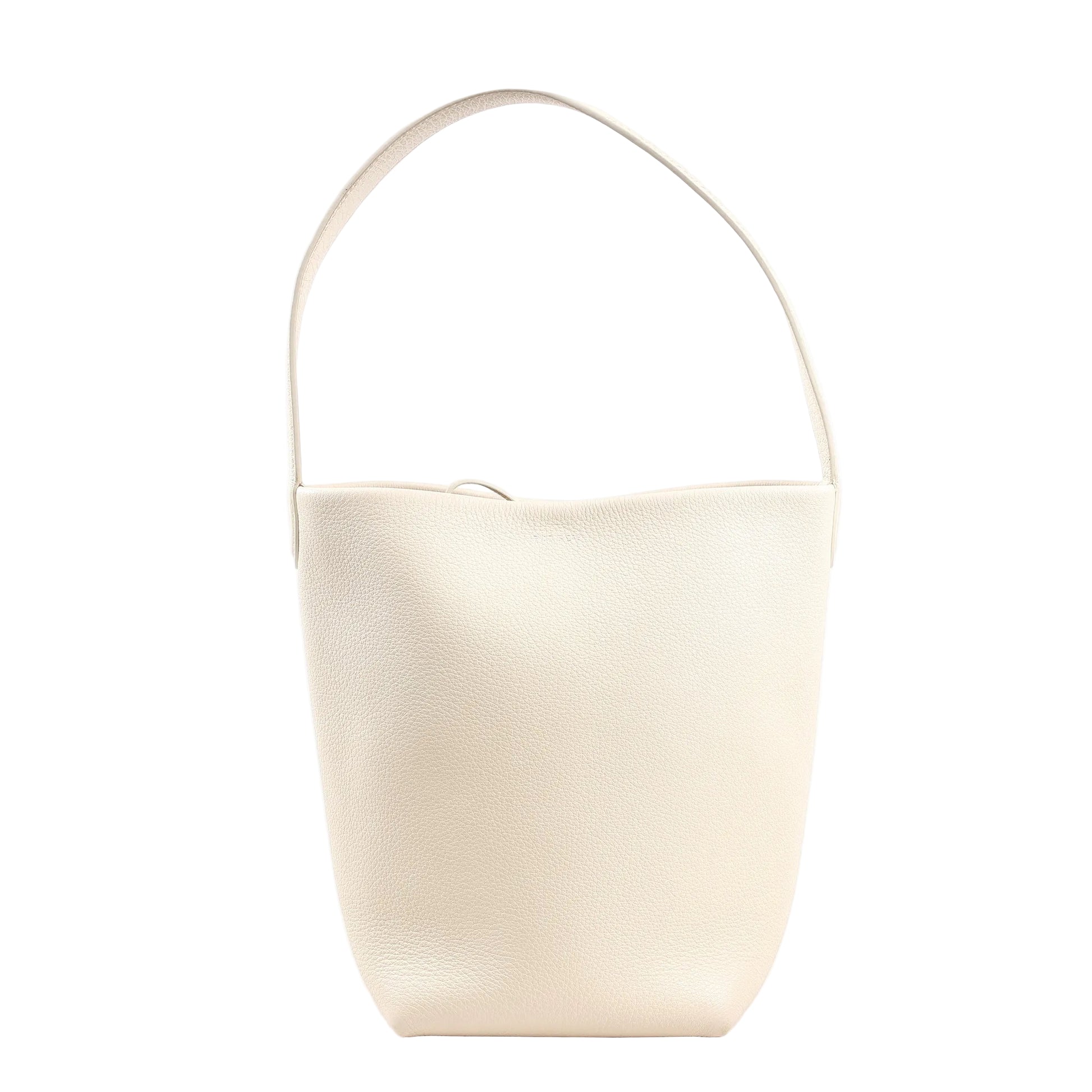 The Row Park Tote Small shoulder bag in ecru grained leather featuring a curved, unstructured silhouette, single wide strap, and minimalist design without visible hardware.