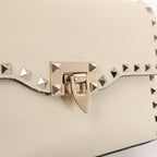 Bolso de hombro Valentino Garavani VLTN de lona y piel en beige y negro