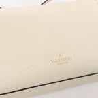 Bolso de hombro Valentino Garavani VLTN de lona y piel en beige y negro