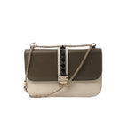 Valentino Rockstud Glam Lock leather crossbody bag in green and beige with black pyramid studs, gold-tone chain strap, and front flap closure.
