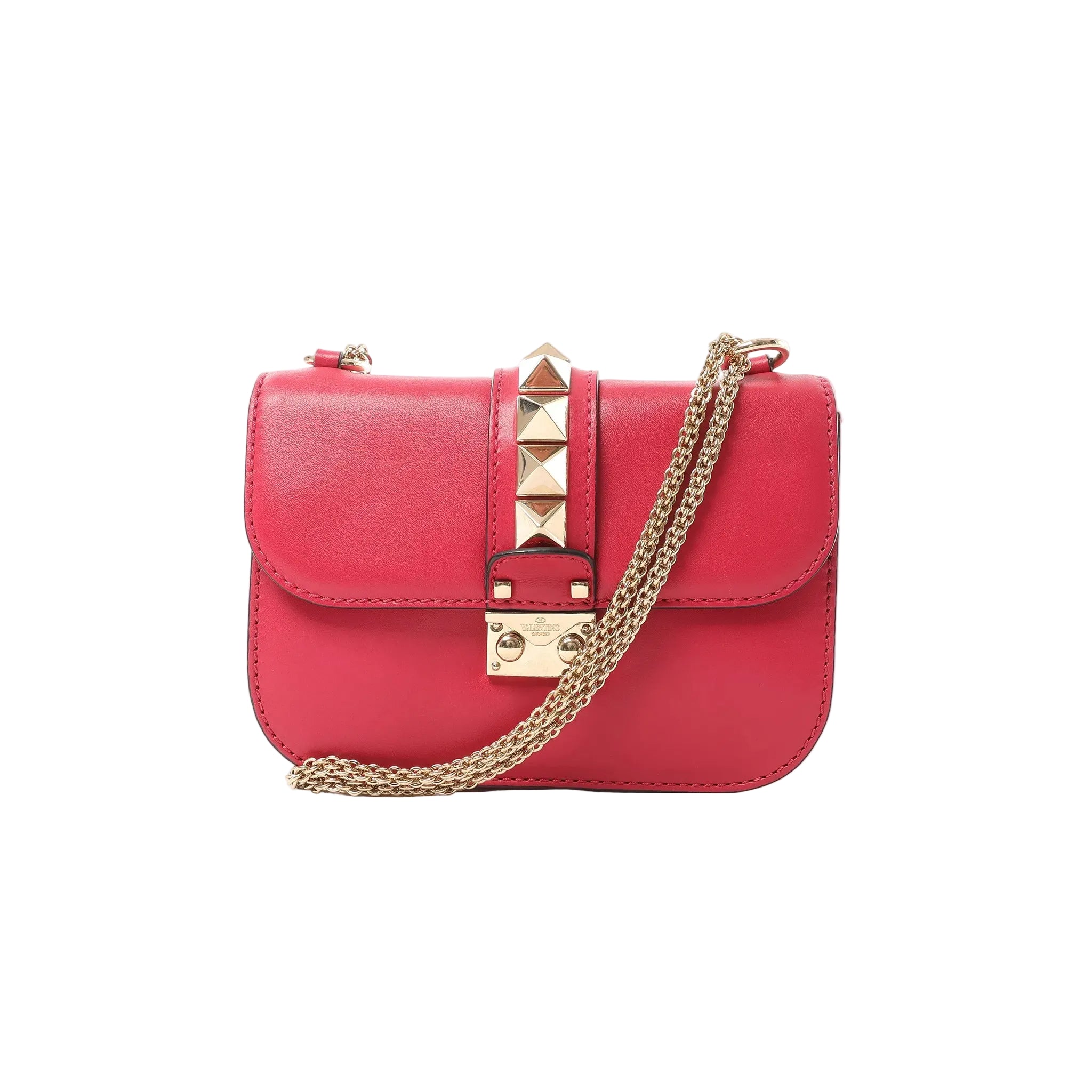 Pink Valentino Rockstud Glam Lock leather crossbody bag with gold-tone pyramid stud strap, front lock closure, and gold chain strap on white background.