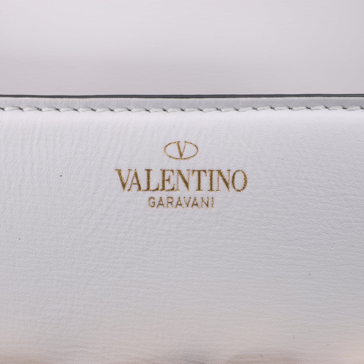 Sac à bandoulière en cuir blanc avec logo V de Valentino Garavani