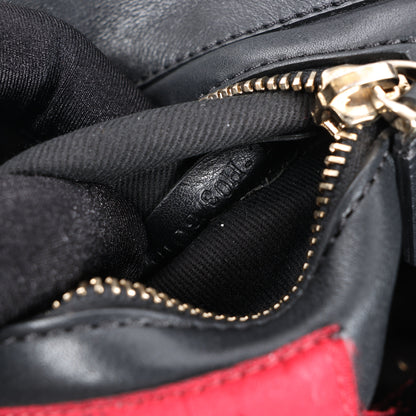 Sac à main Valentino Garavani Rockstud en cuir noir à double compartiment
