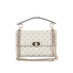 Valentino Garavani white quilted leather shoulder bag with gold-tone pyramid studs, studded top handle, chain strap and turn-lock closure.
