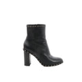 Black Valentino Garavani leather ankle boot with chunky block heel and pyramid Rockstud trim along the top edge and sole welt, shown in side profile.
