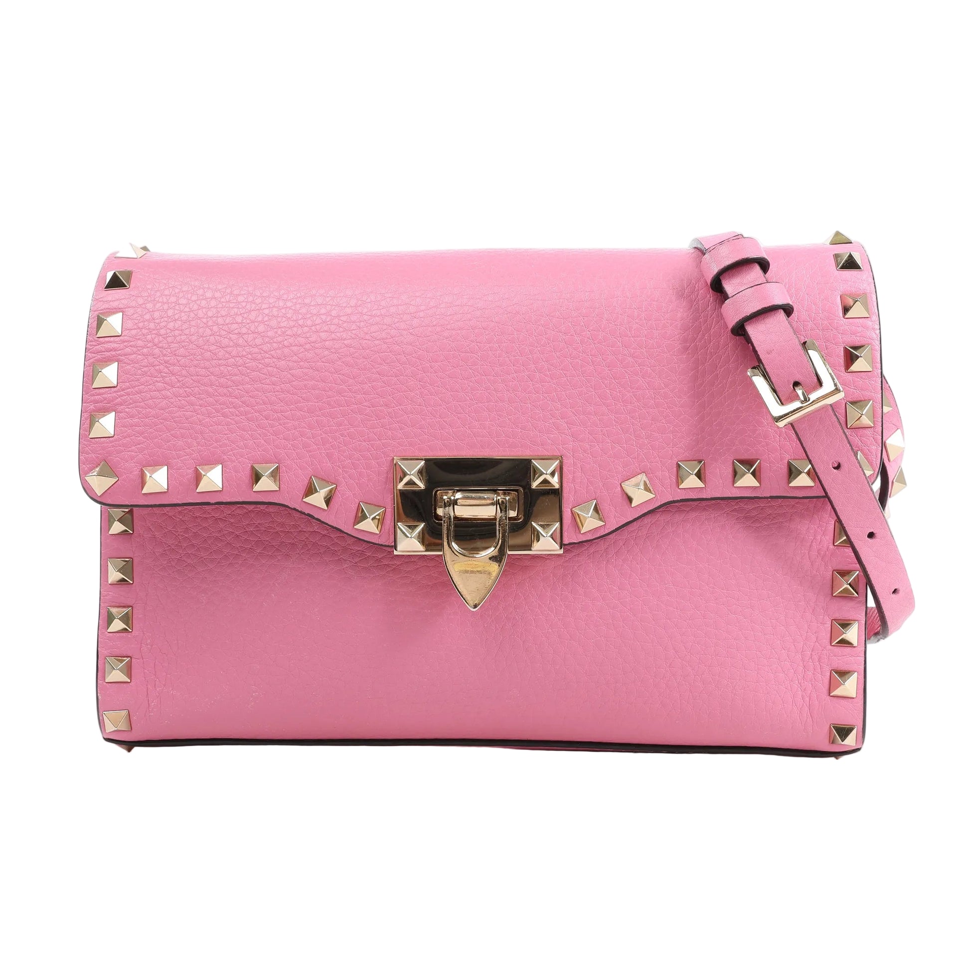 Valentino Garavani Rockstud Shoulder Bag in pebbled pink leather with gold-tone pyramid studs along the edges, front flap closure with turn-lock clasp, and adjustable strap, displayed against a white background.