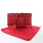 Valentino Garavani Rockstud Leather Shoulder Bag in Red