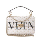 White Valentino Rockstud Spike VLTN quilted leather shoulder bag with gold stud detailing, gold chain strap, top handle, and turn-lock closure on white background