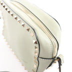 Valentino Garavani Rockstuds Leather Crossbody bag in Green