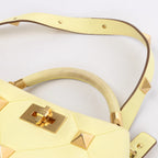 Valentino Garavani Roman Studs Leather 2Way Handbag in Yellow