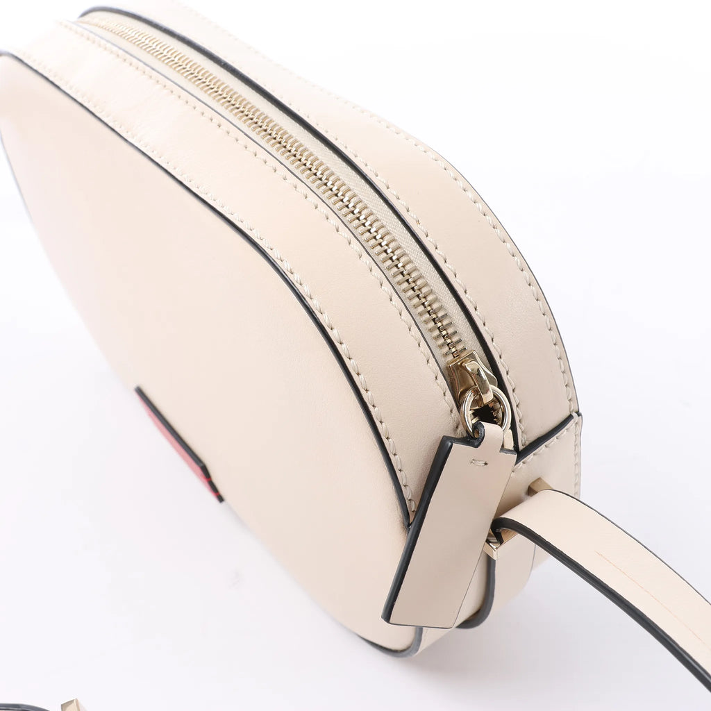 Valentino Garavani V logo Leather Crossbody Bag in Pink