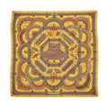 Hermès Parures des Maharajas Carré Géant scarf in golden yellow with intricate multicolour jewel and ornamental motifs.