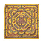 Hermès Parures des Maharajas Carré Géant scarf in golden yellow with intricate multicolour jewel and ornamental motifs.