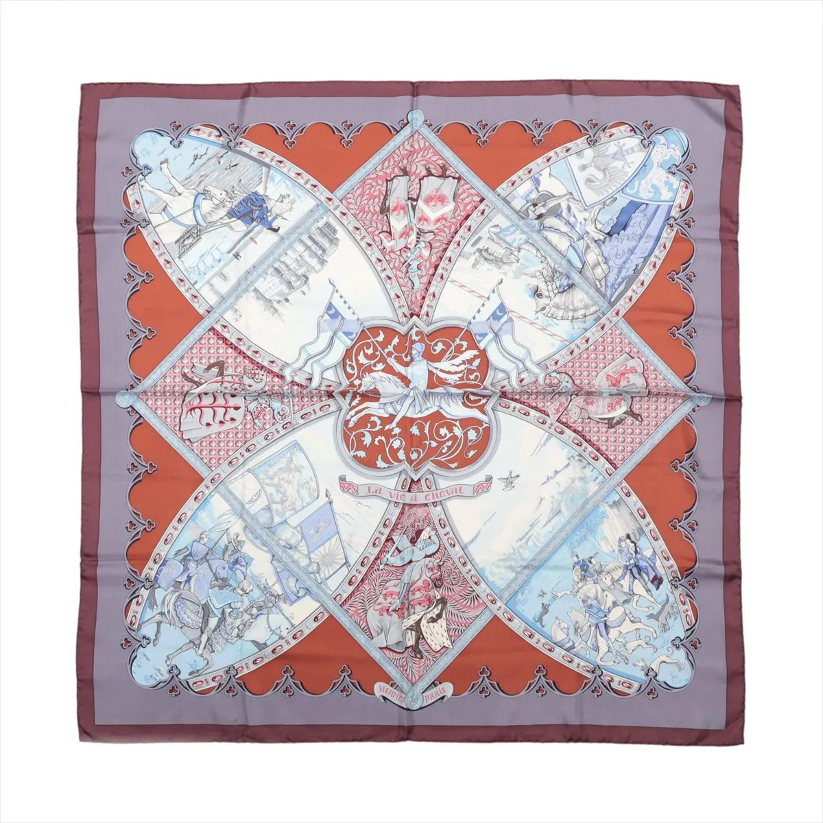 Hermès Carré 90 La Vie à Cheval silk scarf with brown border, red panels, pale blue equestrian scenes and sweeping harness motifs.